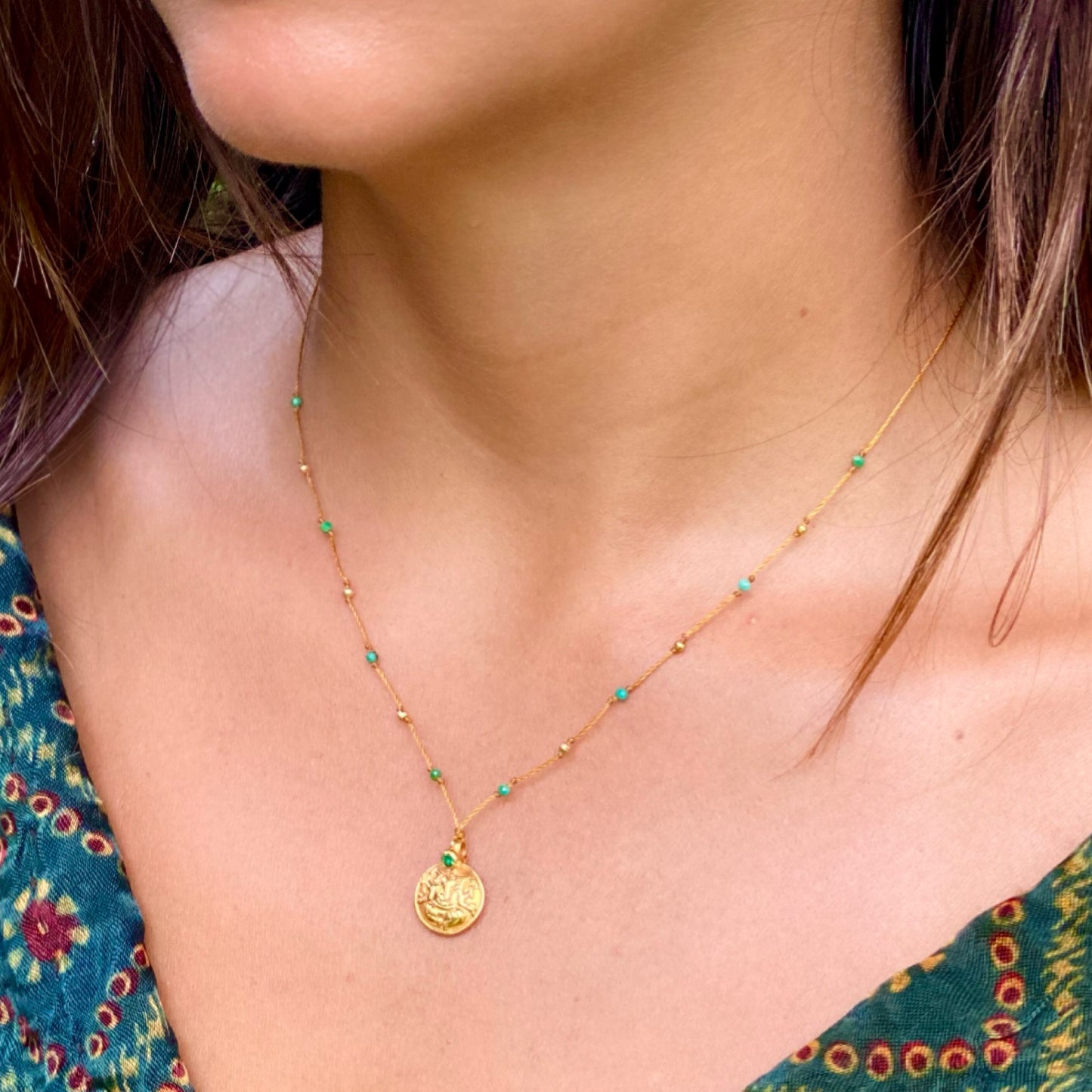 Gold Ganesha with Emerald