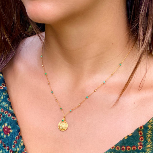 Gold Ganesha with Emerald