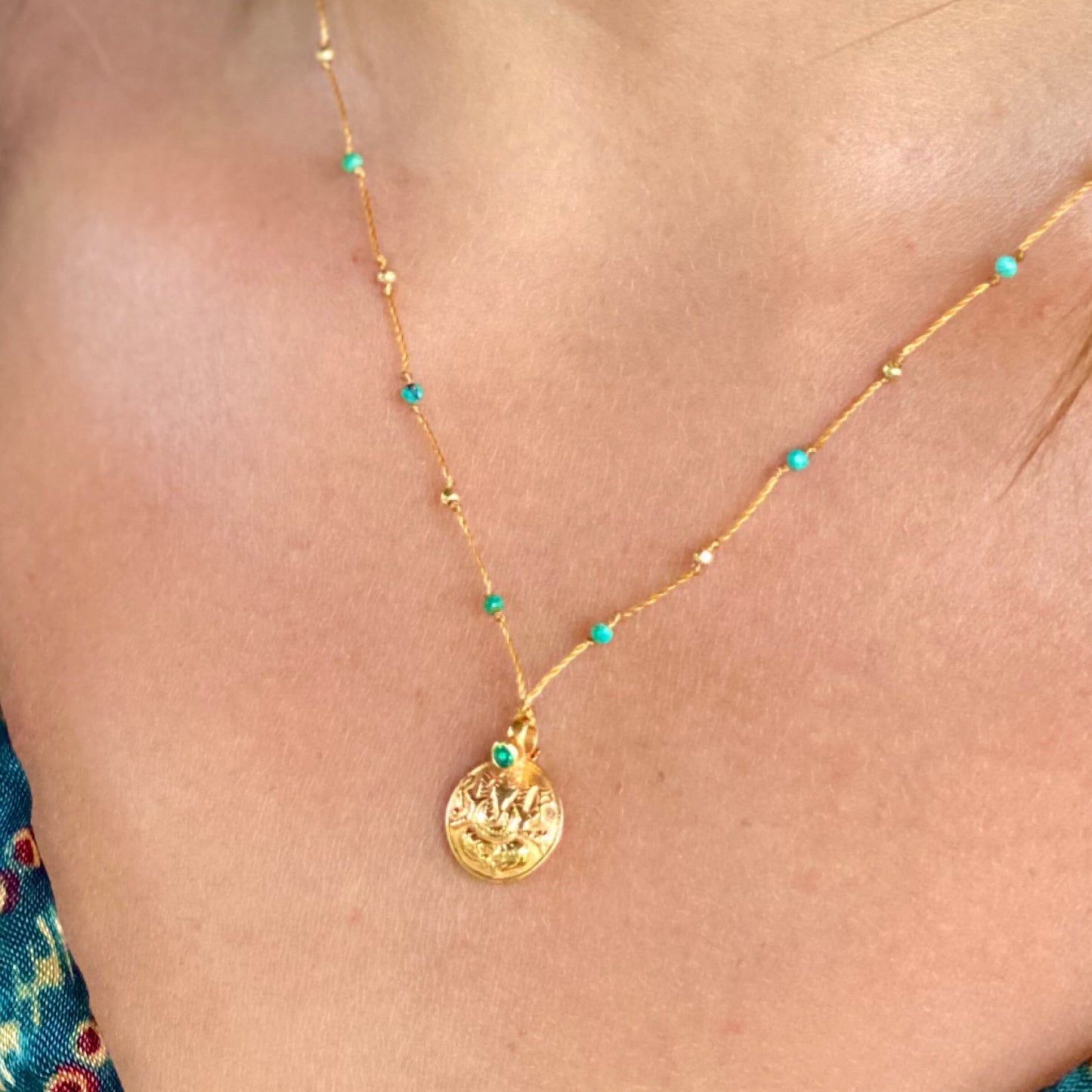 Gold Ganesha with Emerald