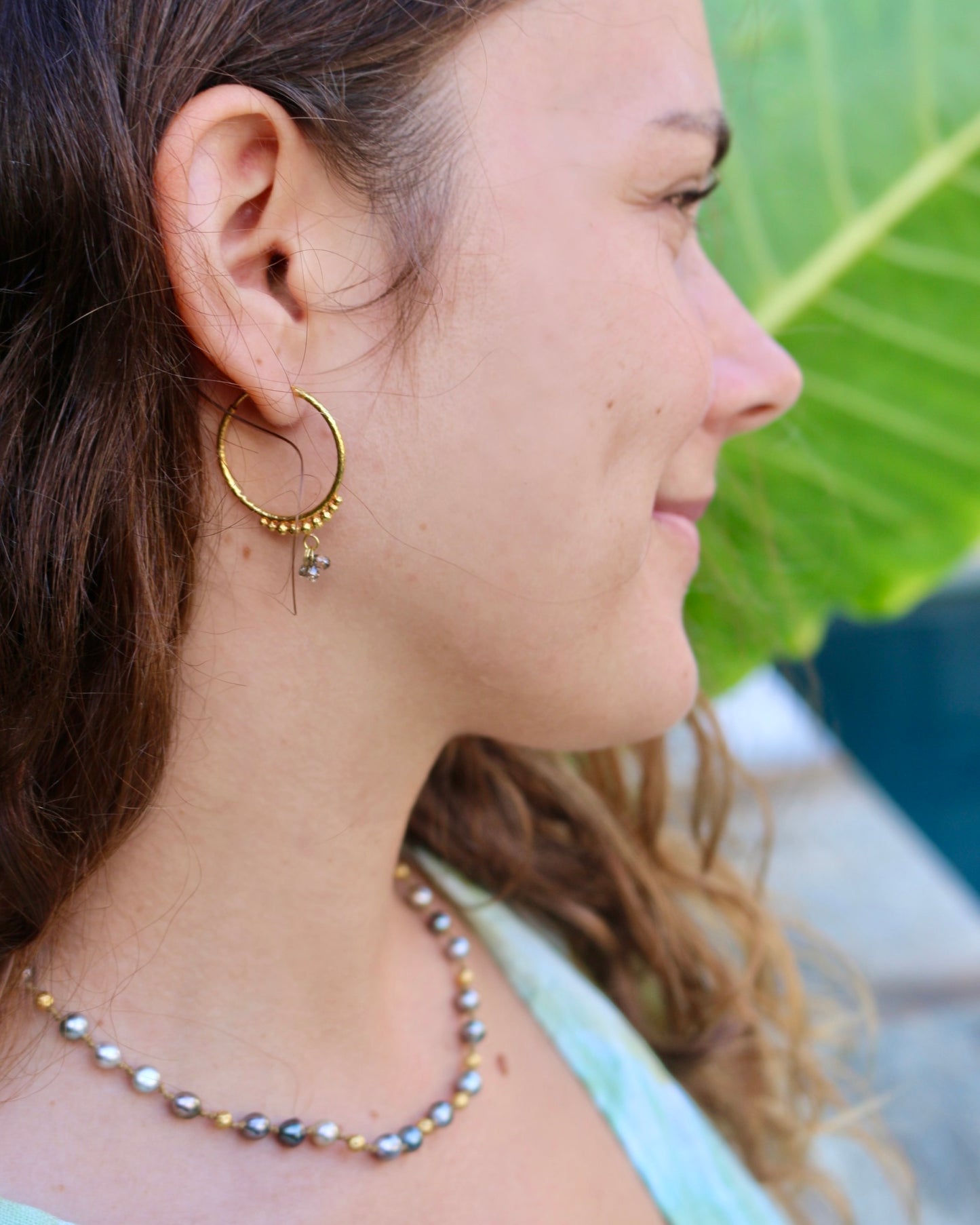 Hand-Hammered Golden Droplet Hoops with Dark Diamonds