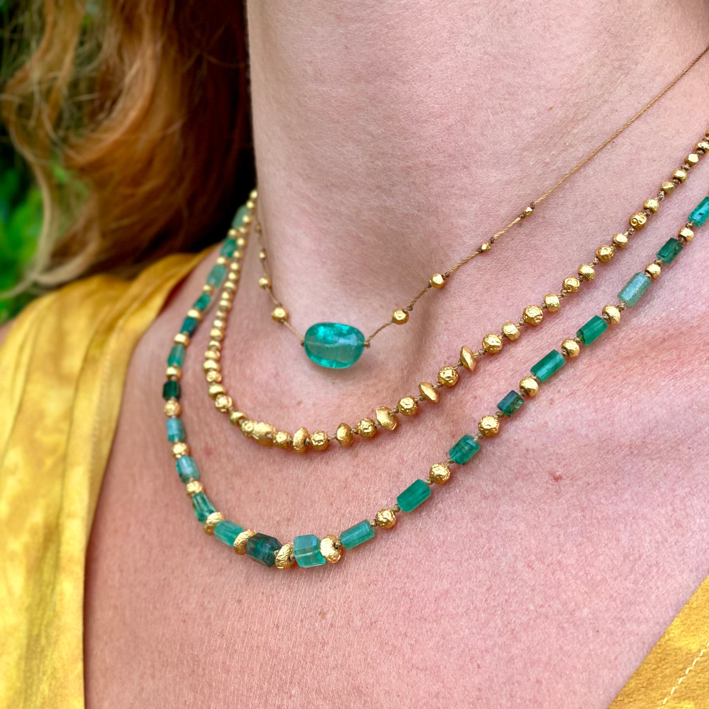 Smooth Emerald & Gold Accent Strand