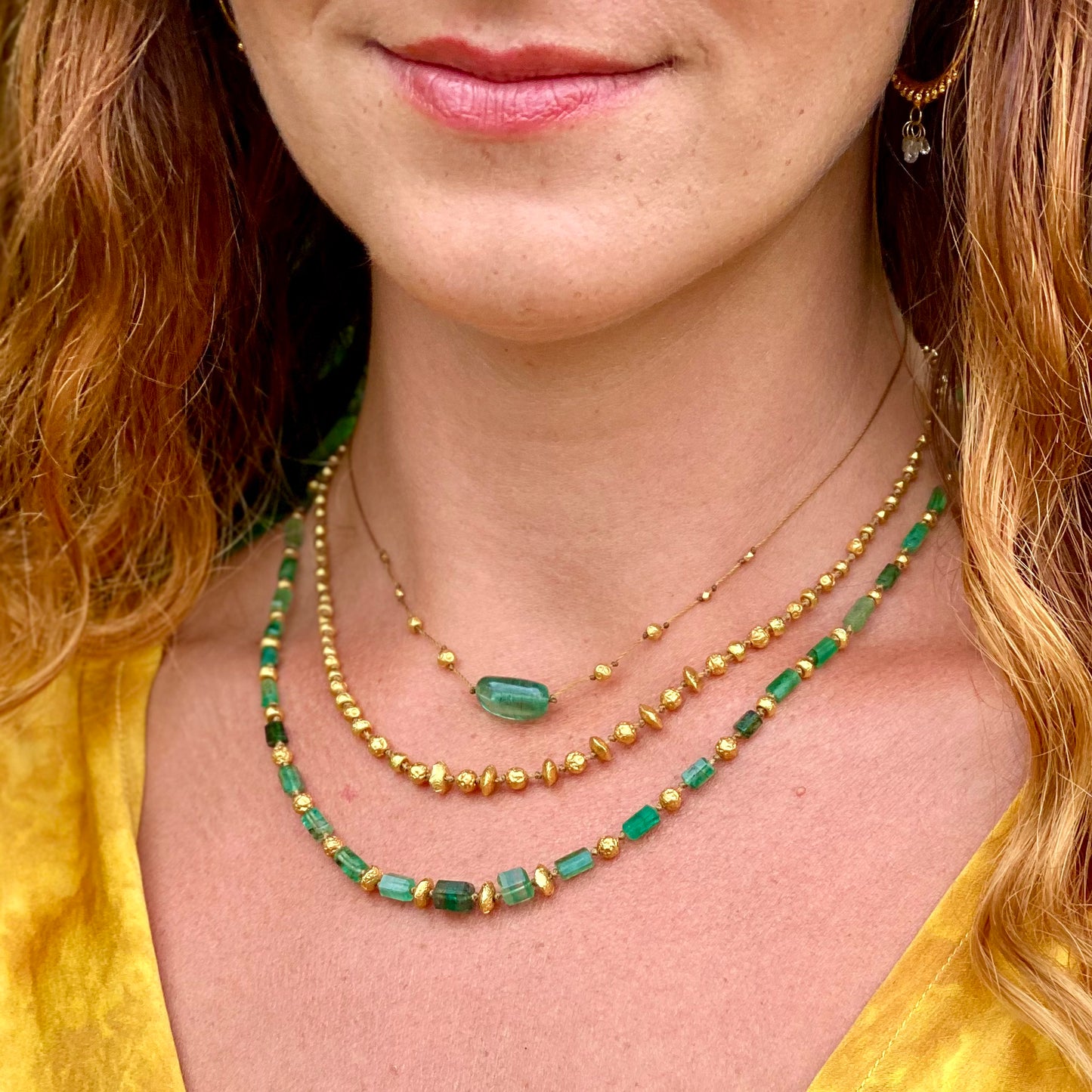 Smooth Emerald & Gold Accent Strand