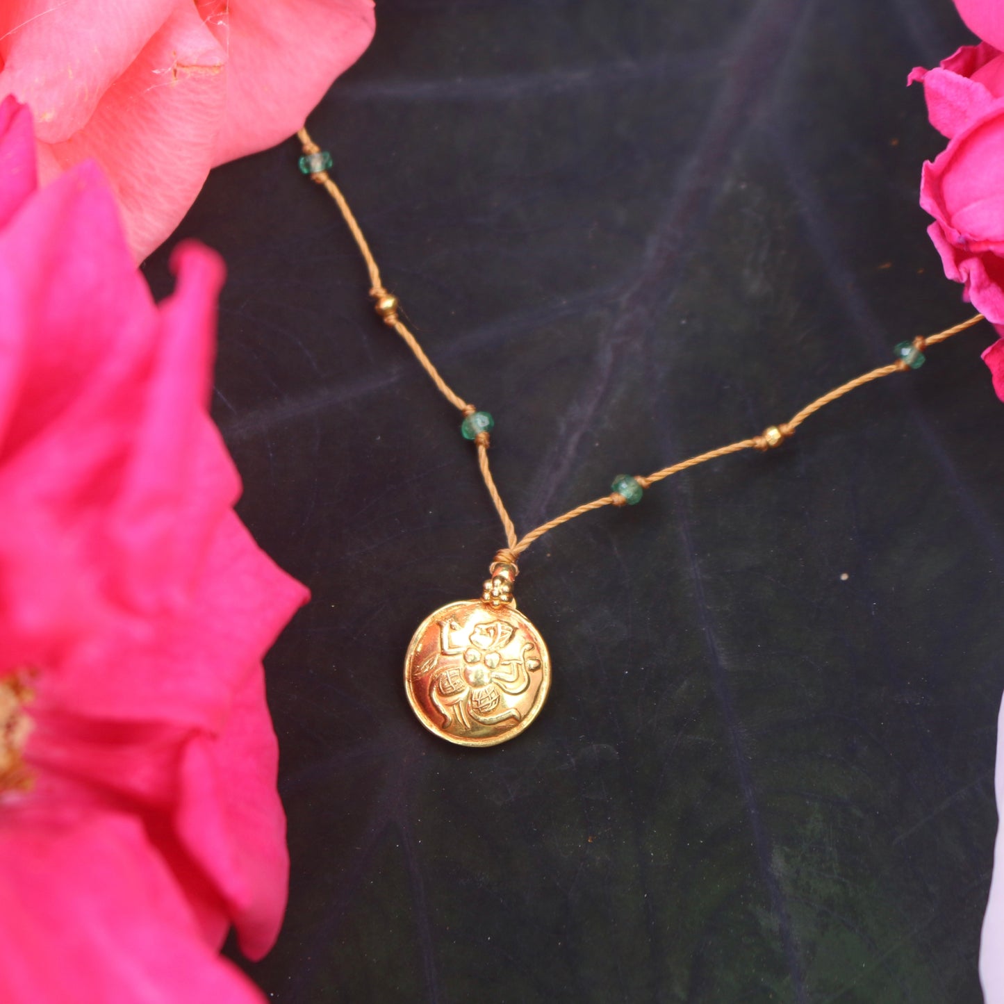 Gold Ganesha with Emerald