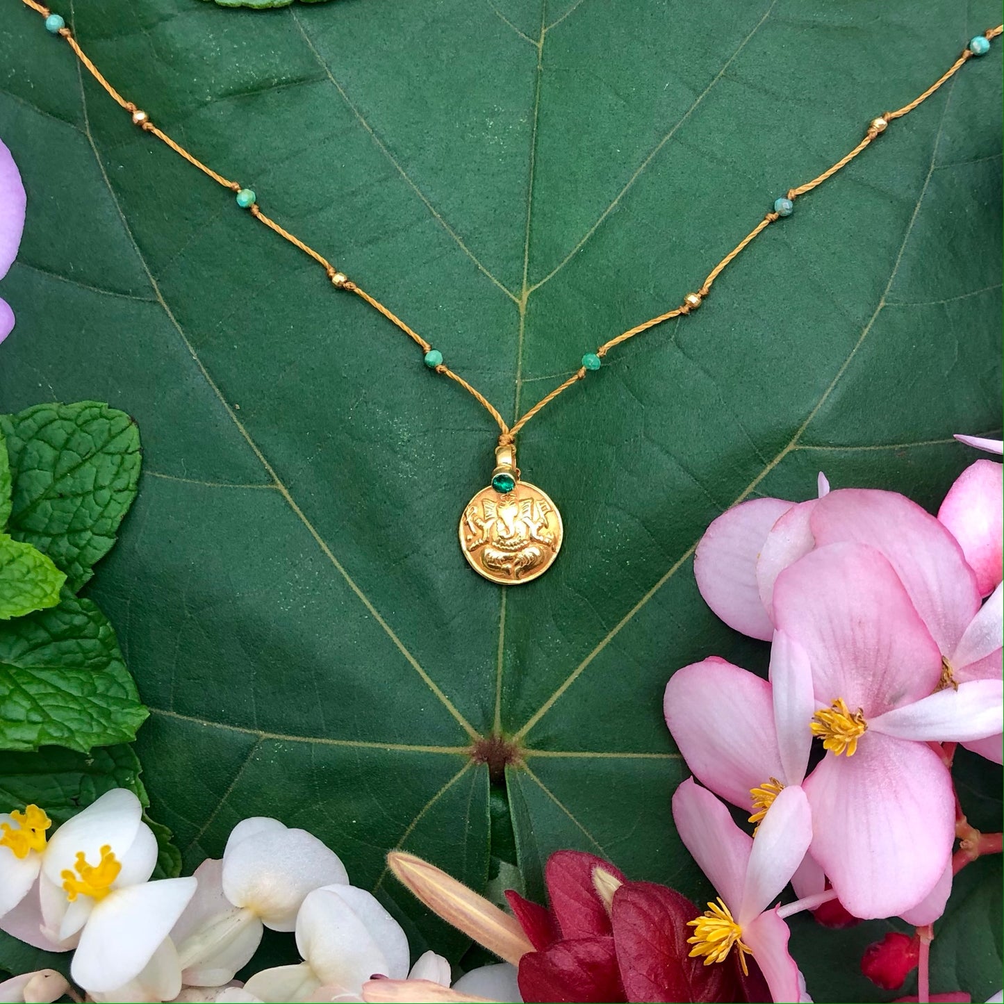 Gold Ganesha with Emerald