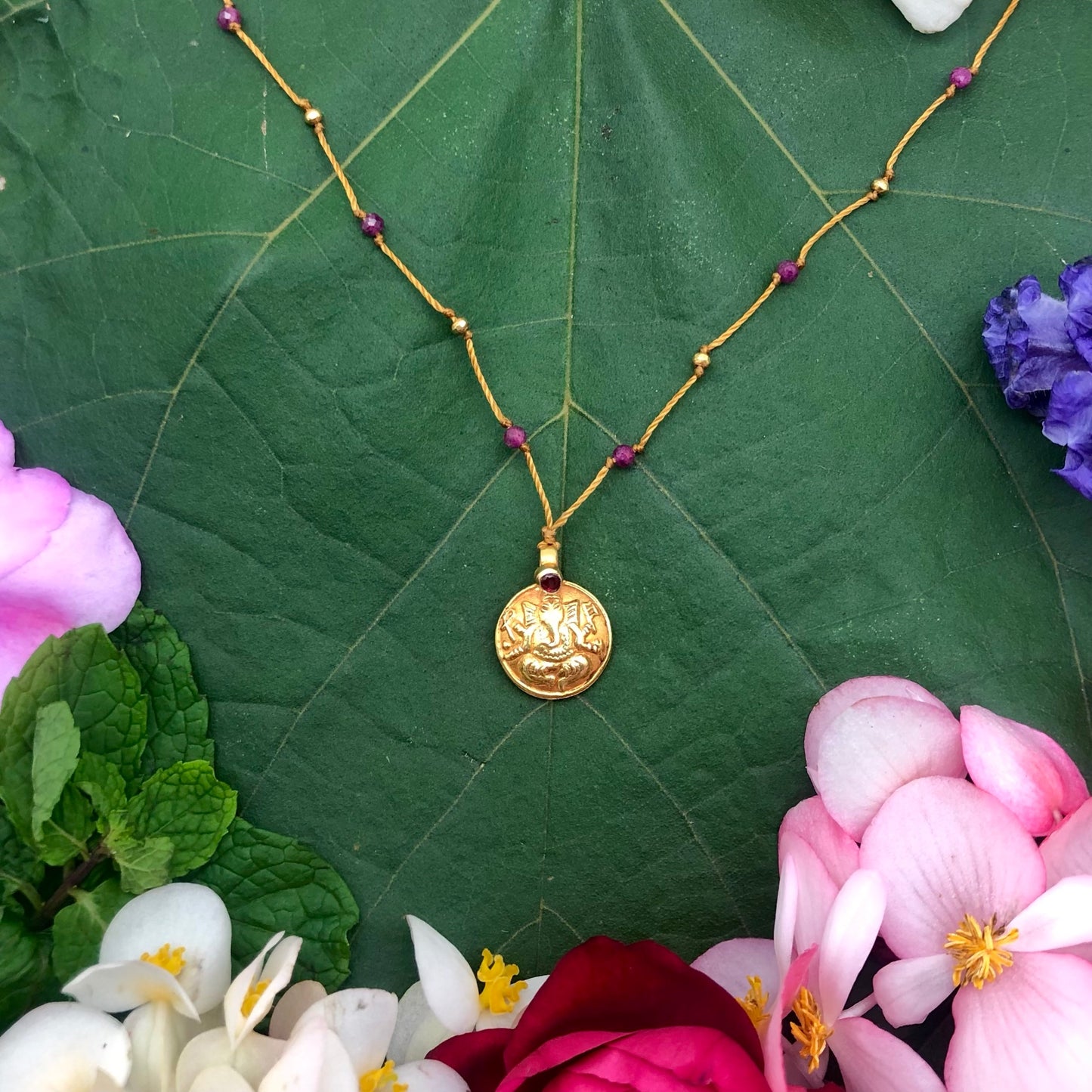 Gold Ganesha with Ruby