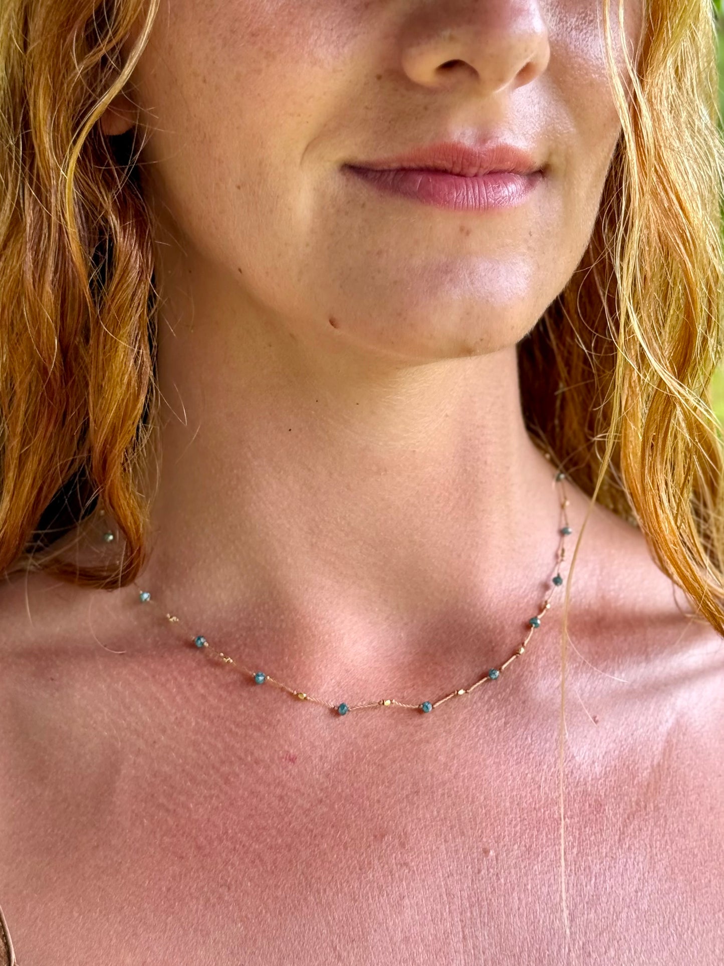 Spacious Teal Diamond & Gold Strand