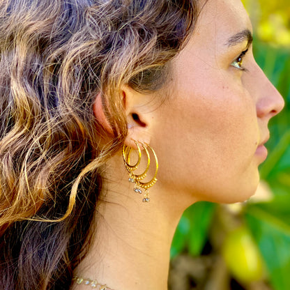 Hand-Hammered Golden Droplet Hoops with Dark Diamonds