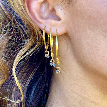 Hand-Hammered Golden Droplet Hoops with Dark Diamonds