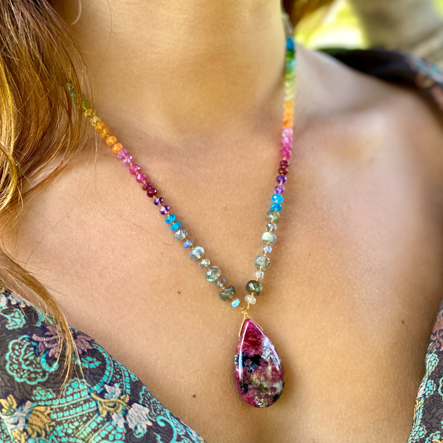 Rhodochrosite with Labradorite Rainbow Mana