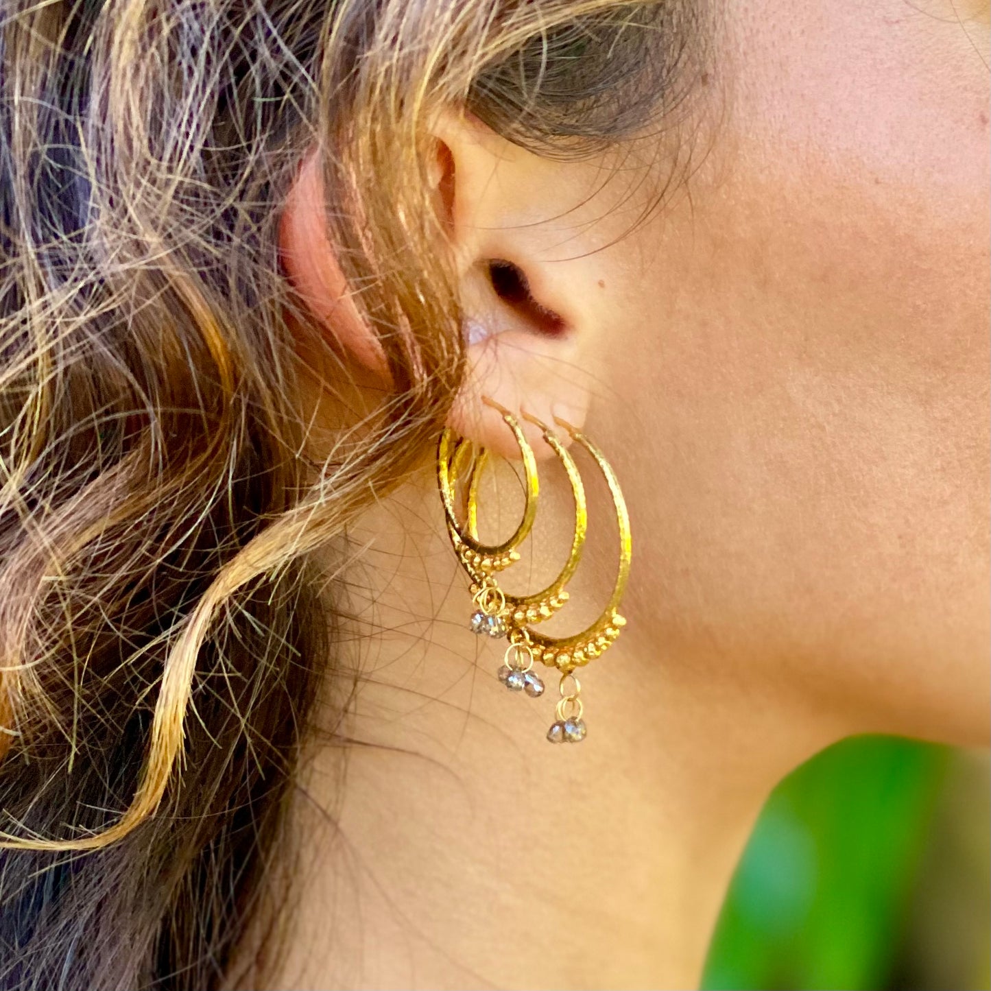 Hand-Hammered Golden Droplet Hoops with Dark Diamonds