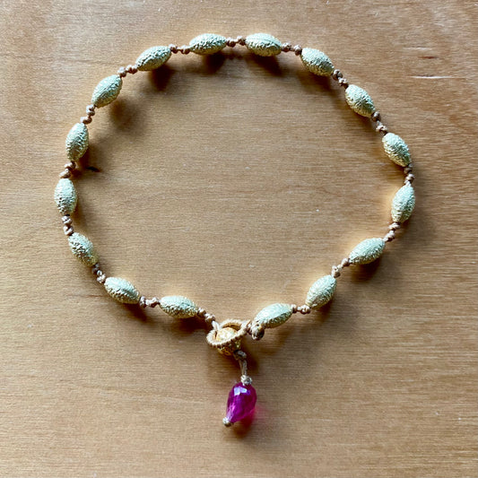 Oblong gold bracelet