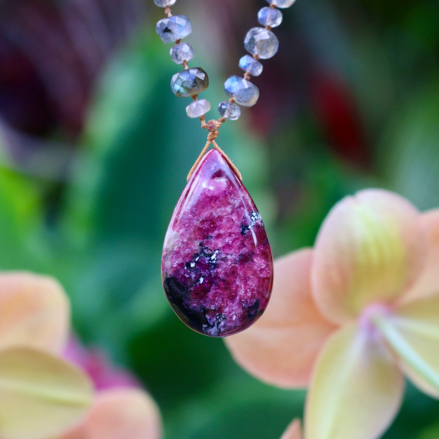 Rhodochrosite with Labradorite Rainbow Mana